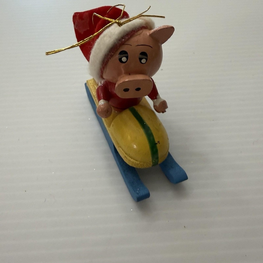 Vintage Taiwan Wooden Pig Riding A Snowmobile Christmas Ornament